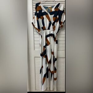 Unbranded 
White color block 
Flowy dress
M 
22p2p
16”top2waist
41”w2 hem
Used